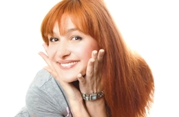 young-woman-smiling-wearing-clear-aligners